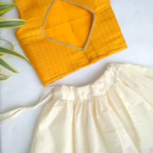 Cute yellow and white pattupavada set