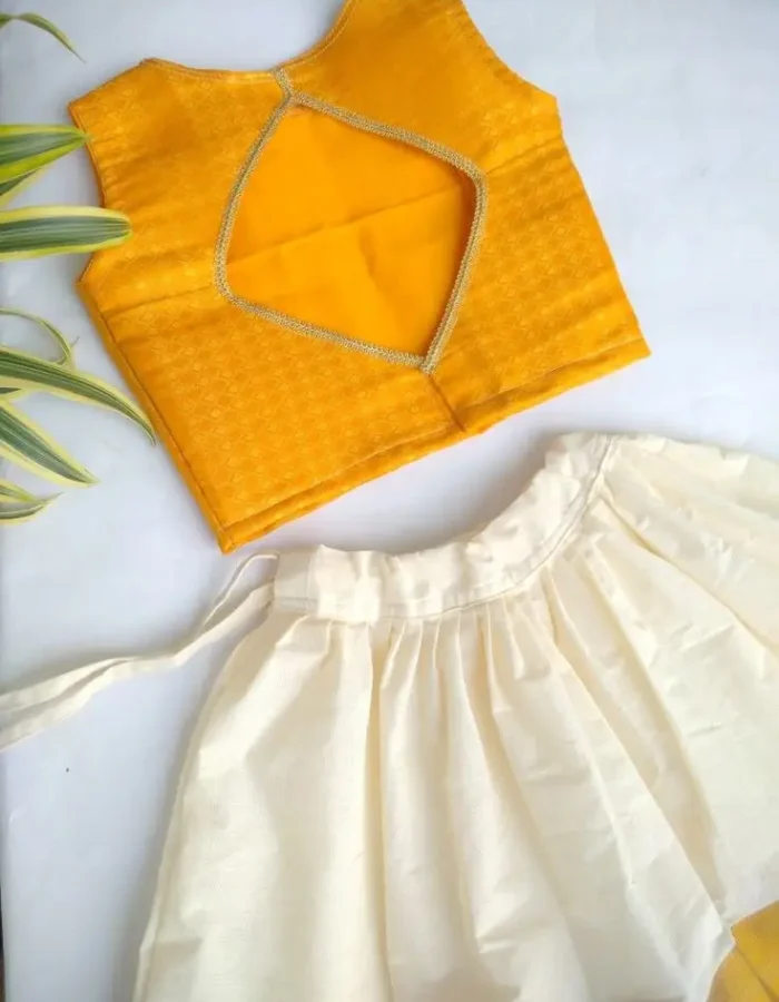 Cute yellow & white pattupavada set